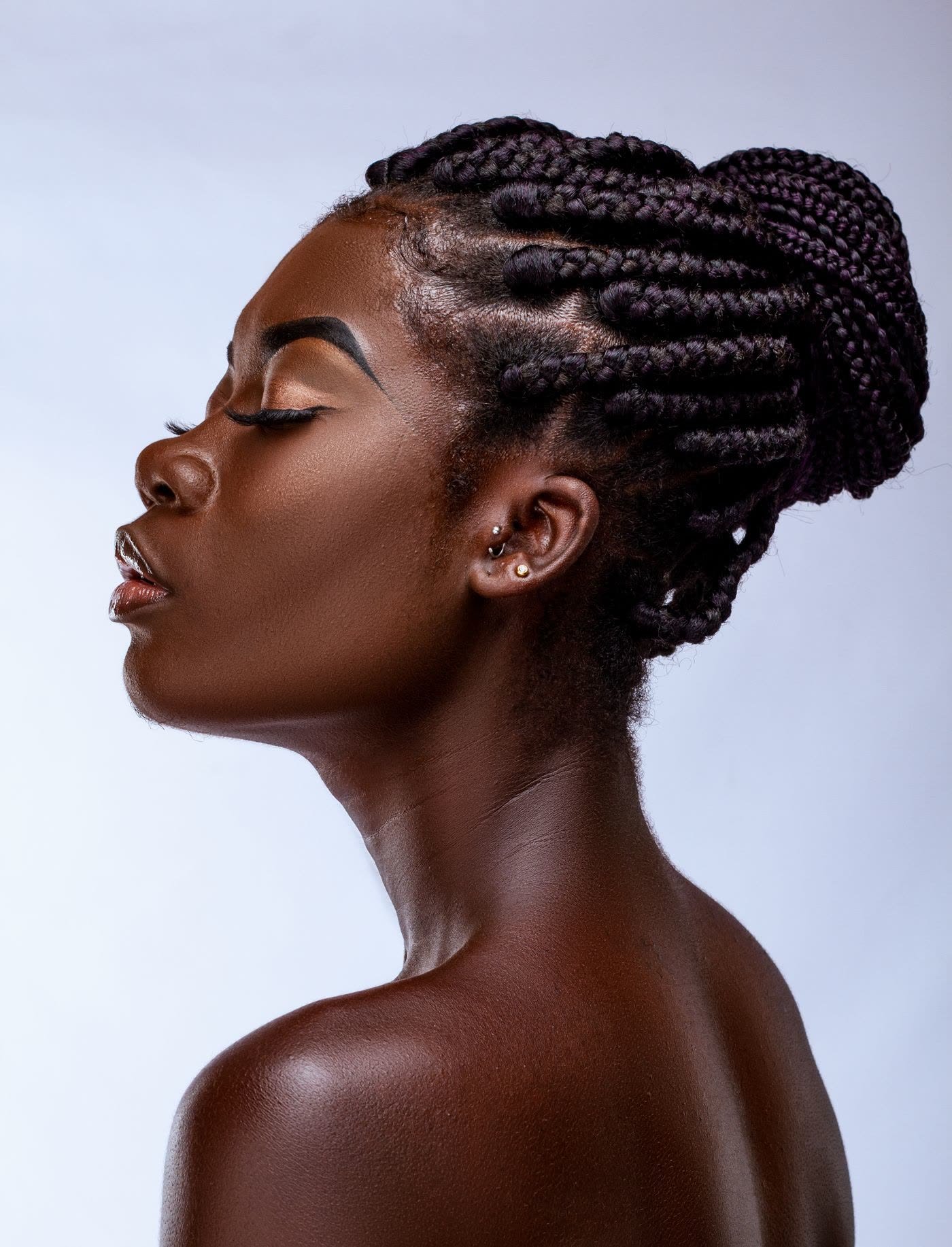 Profile portrait with fine braided detail