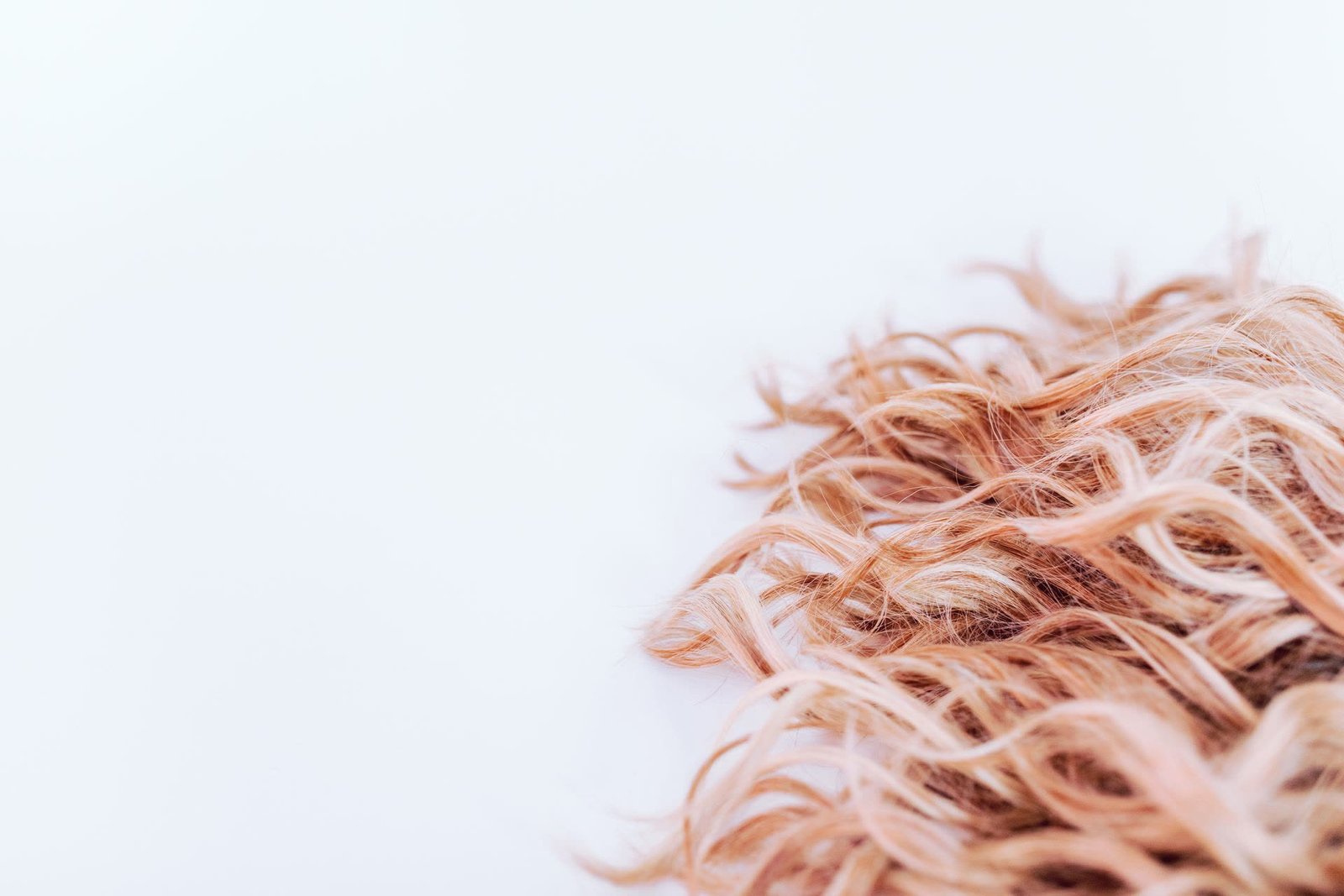 Close-up detail of wig hair texture in motion